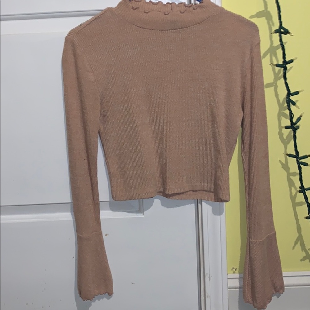 faded pink color long sleeved shirt.